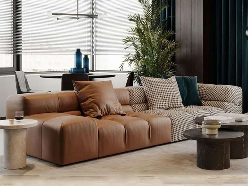 Sofa băng SFA30-4 phong cách hiện đại, chụp từ góc ngang, nổi bật với sự kết hợp vật liệu độc đáo: phần bên trái bọc da nh…