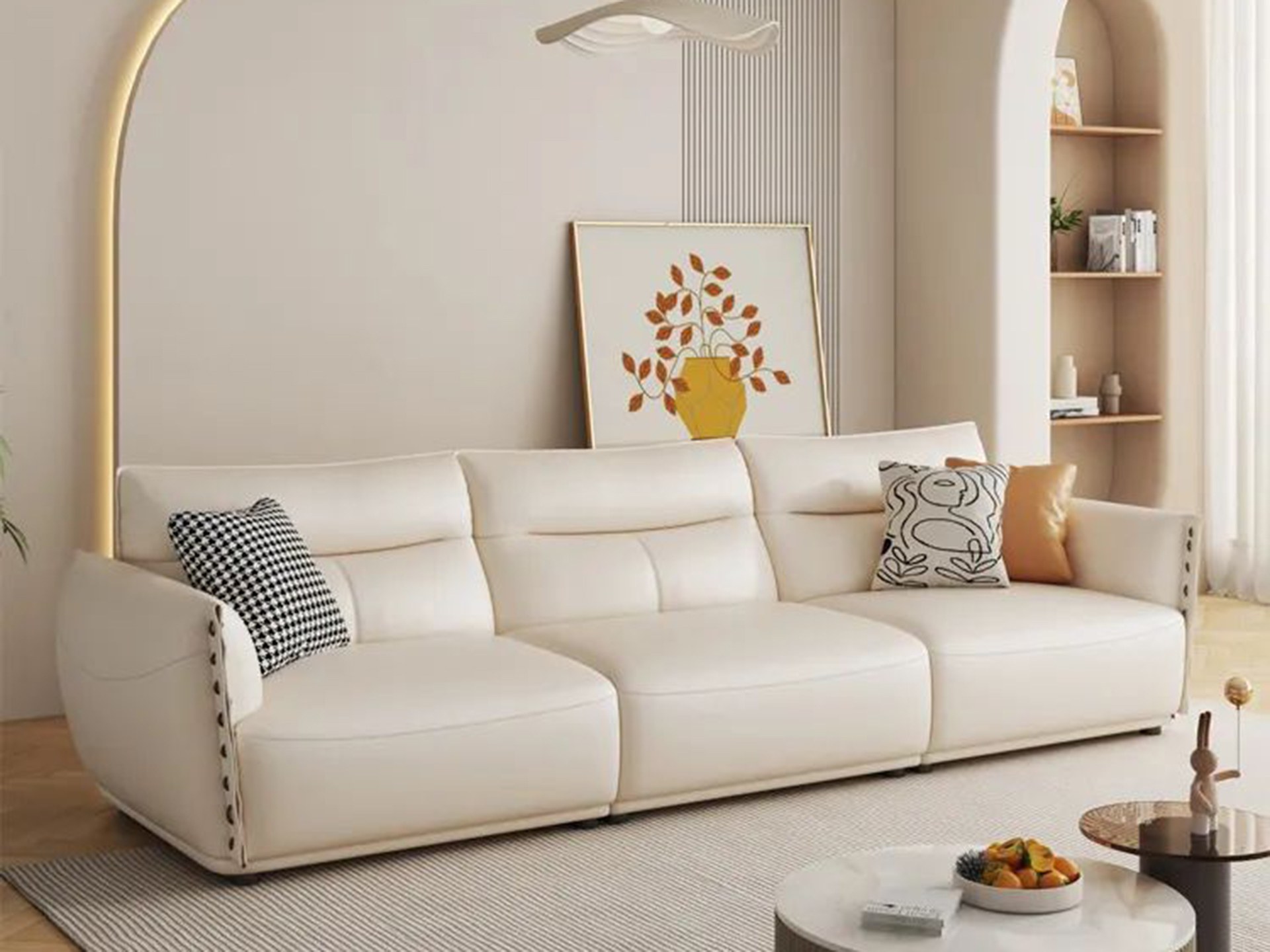 Sofa băng SFA40-4 ba chỗ ngồi, chụp chính diện trong không gian phòng khách hiện đại. Ghế có thiết kế tối giản, bọc da màu…