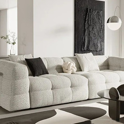 Sofa băng SFA41-4 màu trắng ngà, bọc vải lông cừu mềm mại, được chụp từ góc hơi chếch phía trước. Ghế có thiết kế hiện đại…