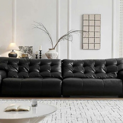 Sofa băng SF-HY02-30 màu đen, chụp chính diện trong không gian phòng khách hiện đại. Ghế có thiết kế tối giản với các múi…