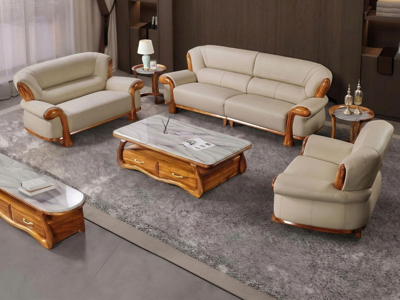 Bộ sofa gỗ Mun nhập khẩu màu be, gồm 1 ghế đơn, 1 ghế đôi, 1 ghế băng dài, kết hợp bàn trà mặt đá marble và bàn phụ, đặt t…