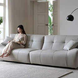 Hình ảnh tổng thể sofa băng SFA31-4 màu be nhạt, đặt trong không gian phòng khách hiện đại, tràn ngập ánh sáng tự nhiên từ…
