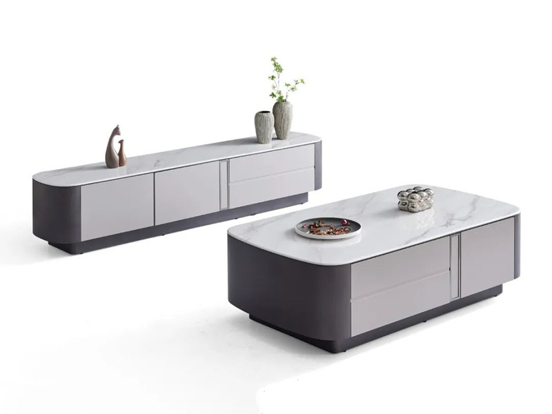 Bộ bàn trà và kệ tivi BTK6101-14KT được chụp từ góc chếch phía trước, nổi bật trên nền trắng. Bàn trà hình chữ nhật bo trò…