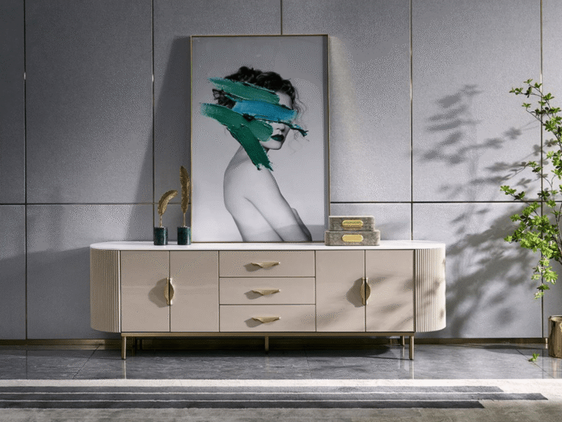 Kệ tivi mặt đá luxury KTW1211 được chụp chính diện, đặt trong không gian phòng khách hoặc sảnh sang trọng. Kệ có thân màu…