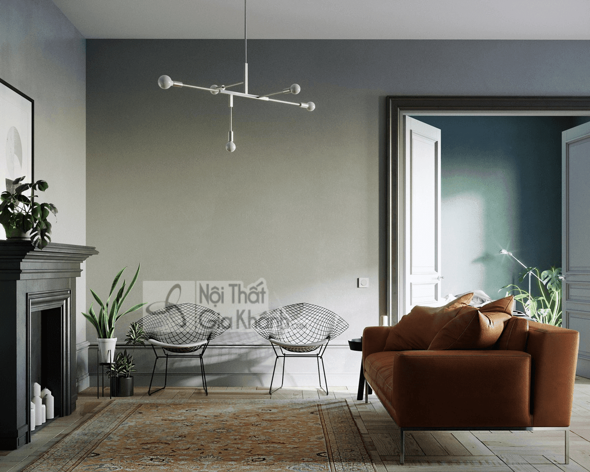 Thảm tông nâu truyền thống phối cùng ghế hiện đại và sofa màu nâu