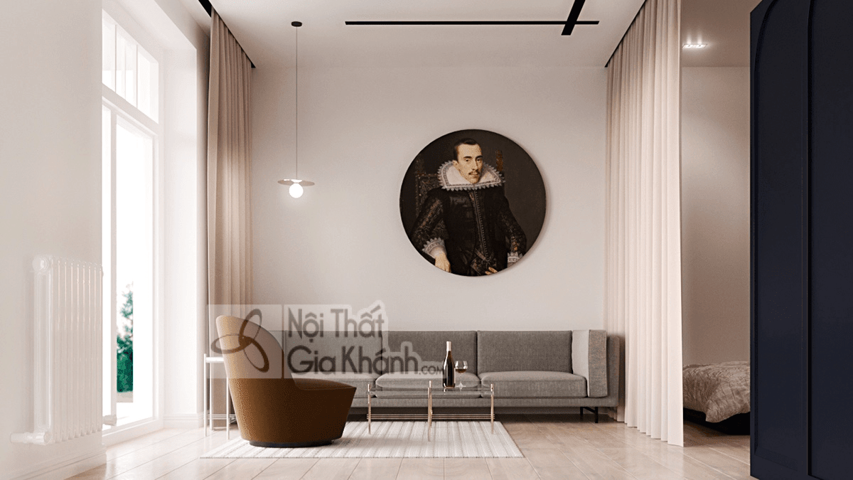 Tường một màu tối giản làm nền cho sofa màu nâu nổi bật
