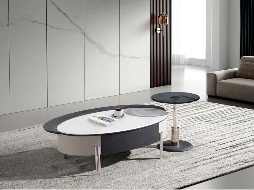 Góc chụp cận cảnh bộ bàn trà đôi BT2521A, tập trung vào chi tiết bàn chính hình oval với mặt đá vi tinh thể màu trắng tinh…