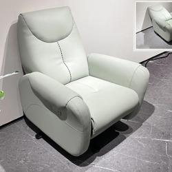 Ghế thư giãn điện E72 màu xanh mint nhạt, chụp từ góc hơi chếch phía trước bên phải, đặt trên sàn gạch xám. Ghế có kiểu dá…