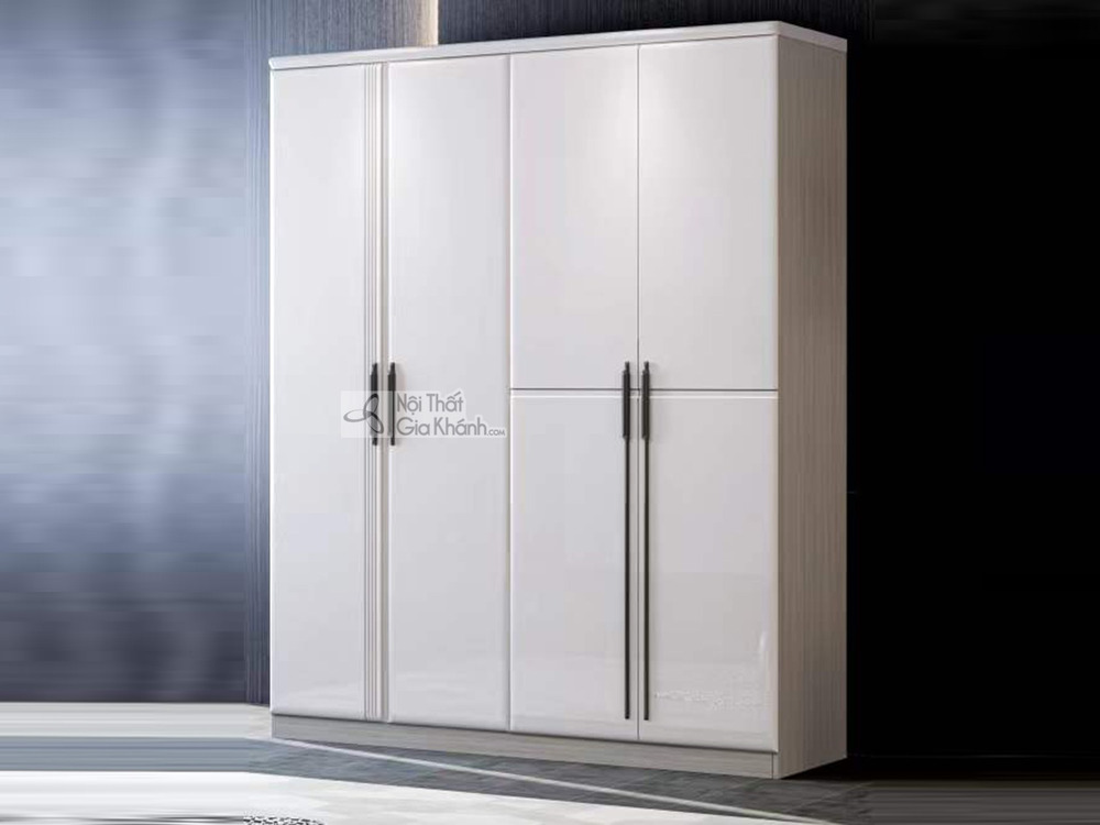 Tủ quần áo 4 cánh TU1901 màu trắng tinh tế, được chụp chính diện trong không gian phòng ngủ tối giản. Tủ có thiết kế hiện…