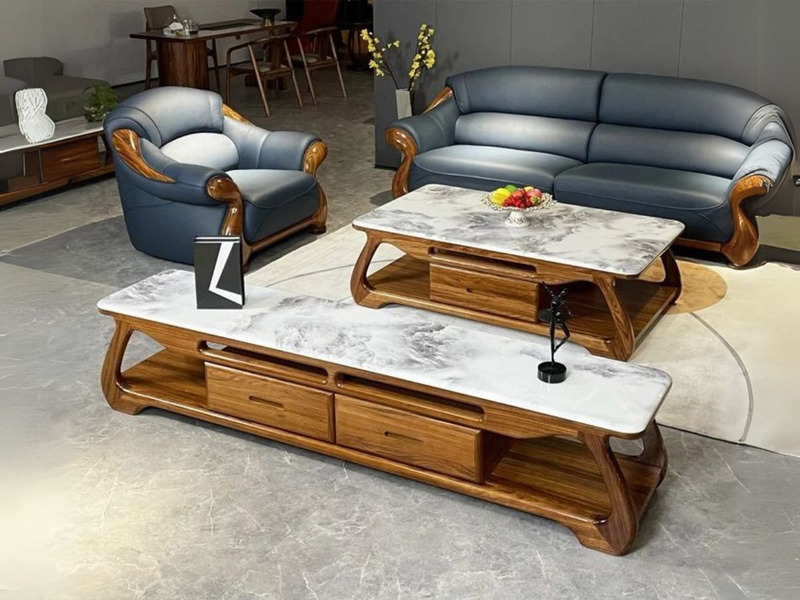 Ảnh chụp tổng thể bộ bàn trà và kệ tivi Gỗ Mun Nhập Khẩu A03 từ góc trên cao, đặt trong không gian showroom. Bàn trà hình…