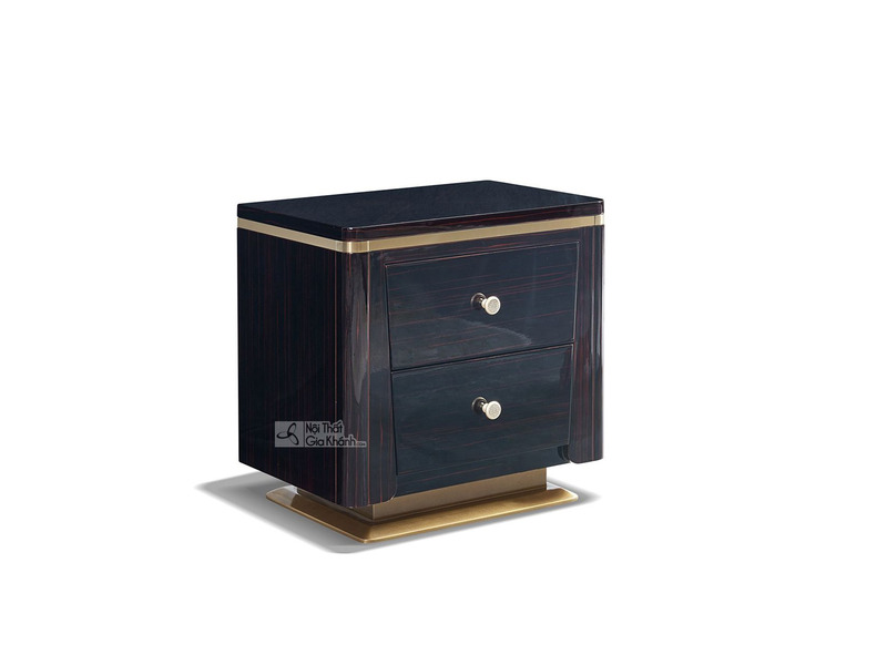 Tủ đầu giường Luxury TAGD03 được chụp từ góc 3/4 phía trước bên trái, nổi bật với thiết kế hình hộp chữ nhật bo tròn các c…