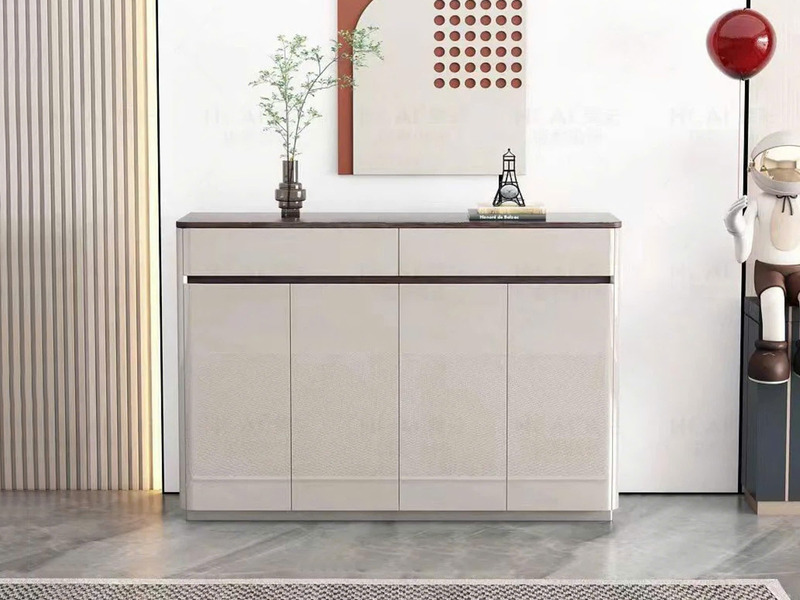 Tủ giầy hiện đại TDY204 được chụp chính diện, nổi bật với thiết kế tối giản, gồm bốn cánh tủ màu trắng kem và hai ngăn kéo…