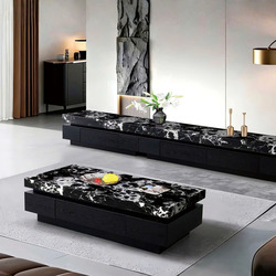 Ảnh chụp tổng thể bộ bàn trà và kệ tivi Y25-14/18 đặt trong không gian phòng khách hiện đại. Bàn trà hình chữ nhật với mặt…