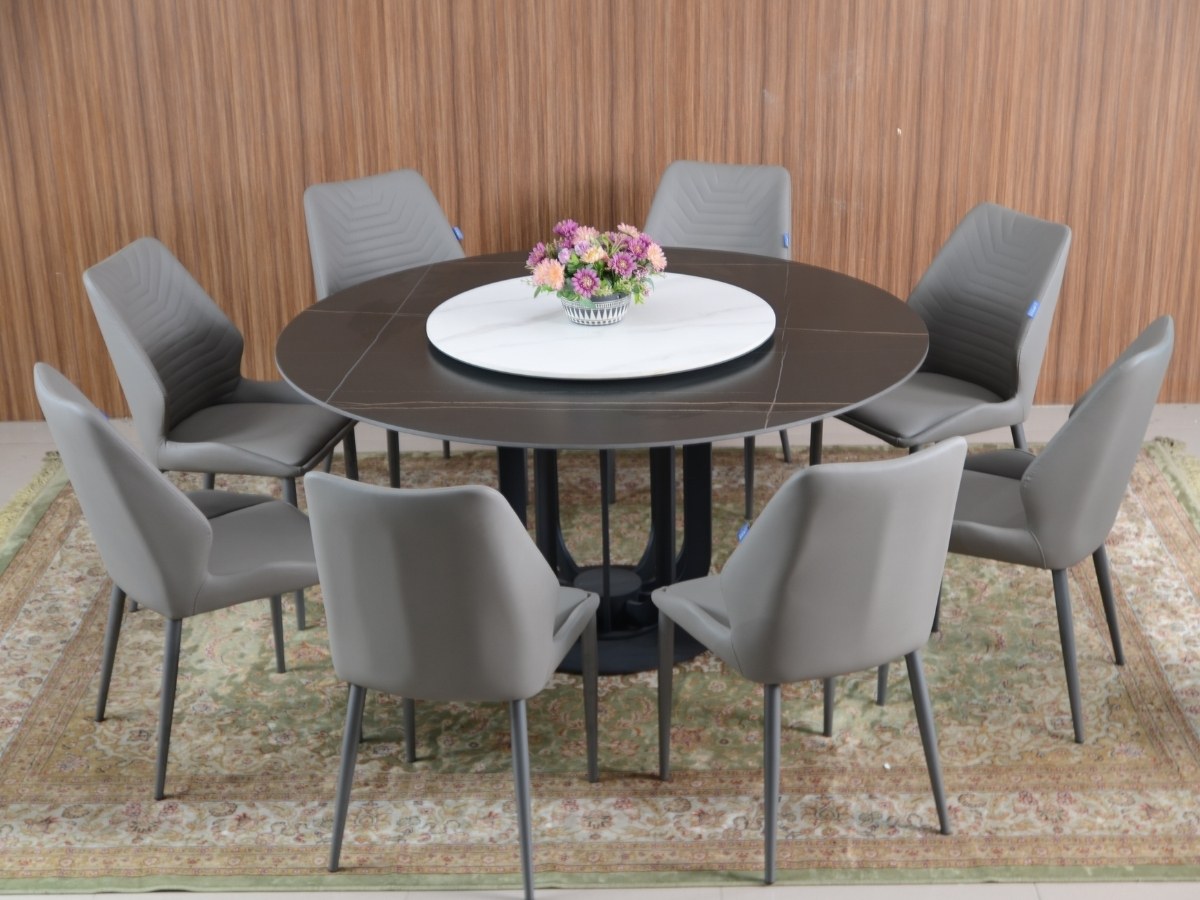 Bàn ăn tròn hiện đại mặt đá 1m5 phối ghế ăn bọc da tại showroom