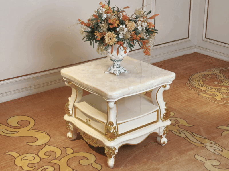 Bàn trà góc BGA98 phong cách tân cổ điển, chụp chính diện hơi chếch góc, đặt trong không gian phòng khách sang trọng. Bàn…