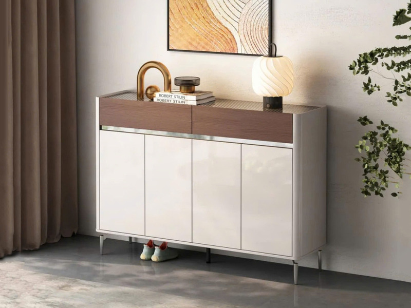Tủ giày hiện đại TDY304-14 được chụp chính diện, đặt trong không gian tiền sảnh với tông màu sáng. Tủ có thiết kế hai tầng…