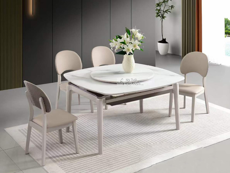 Bộ bàn ăn thông minh BA102-13 được chụp từ góc hơi chếch, cho thấy mặt bàn đá phiến hình chữ nhật bo tròn màu trắng vân mâ…