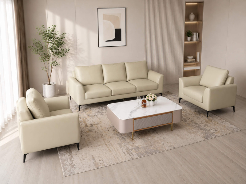 Toàn cảnh bộ sofa E001-113 da Nano màu kem nhạt, bao gồm ghế băng 3, ghế băng 1 và ghế đơn, được sắp xếp gọn gàng trong ph…