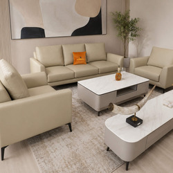 Góc nhìn cận cảnh bộ sofa E001-113 da Nano màu kem nhạt, nhấn mạnh ghế băng dài và ghế đơn với thiết kế tay vịn bo tròn mề…