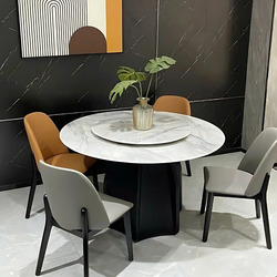 Bộ bàn ăn tròn HY-130 phong cách hiện đại được chụp từ góc chính diện trong không gian phòng ăn. Bàn có mặt đá cẩm thạch n…