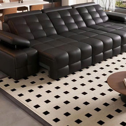 Sofa băng chỉnh điện SF64-31 màu đen tuyền, bọc da bò tự nhiên, được chụp từ góc nhìn hơi cao xuống, đặt trong không gian…