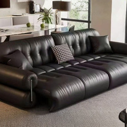 Chiếc sofa chỉnh điện SF-HY08 màu đen sang trọng, được chụp từ góc hơi chếch, nổi bật kiểu dáng góc chữ L hiện đại với các…