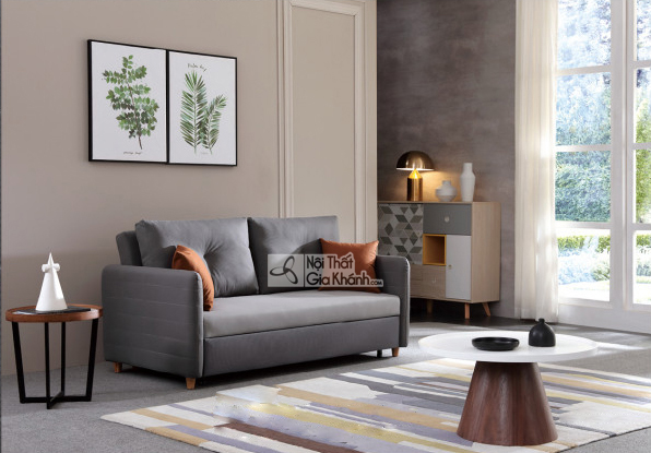 Sofa giường SF177 màu xám ghi, chụp góc chính diện trong trạng thái sofa. Sản phẩm có kiểu dáng hiện đại, tối giản với tay…