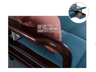 Cận cảnh chi tiết tay vịn gỗ màu nâu sẫm của sofa SF273B, với đường cong mềm mại, bo tròn tinh tế. Bên cạnh là phần đệm bọ…