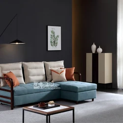 Ghế sofa góc kiêm giường ngủ thông minh SF273B-2G màu xanh ngọc bích, đặt trong không gian phòng khách hiện đại. Sofa có t…