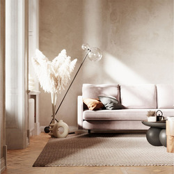 Sofa văng Abbe SF-429 màu hồng nhạt, chụp từ góc thấp, nhìn thấy toàn bộ chiều dài sofa. Sofa được đặt trên thảm dệt màu b…