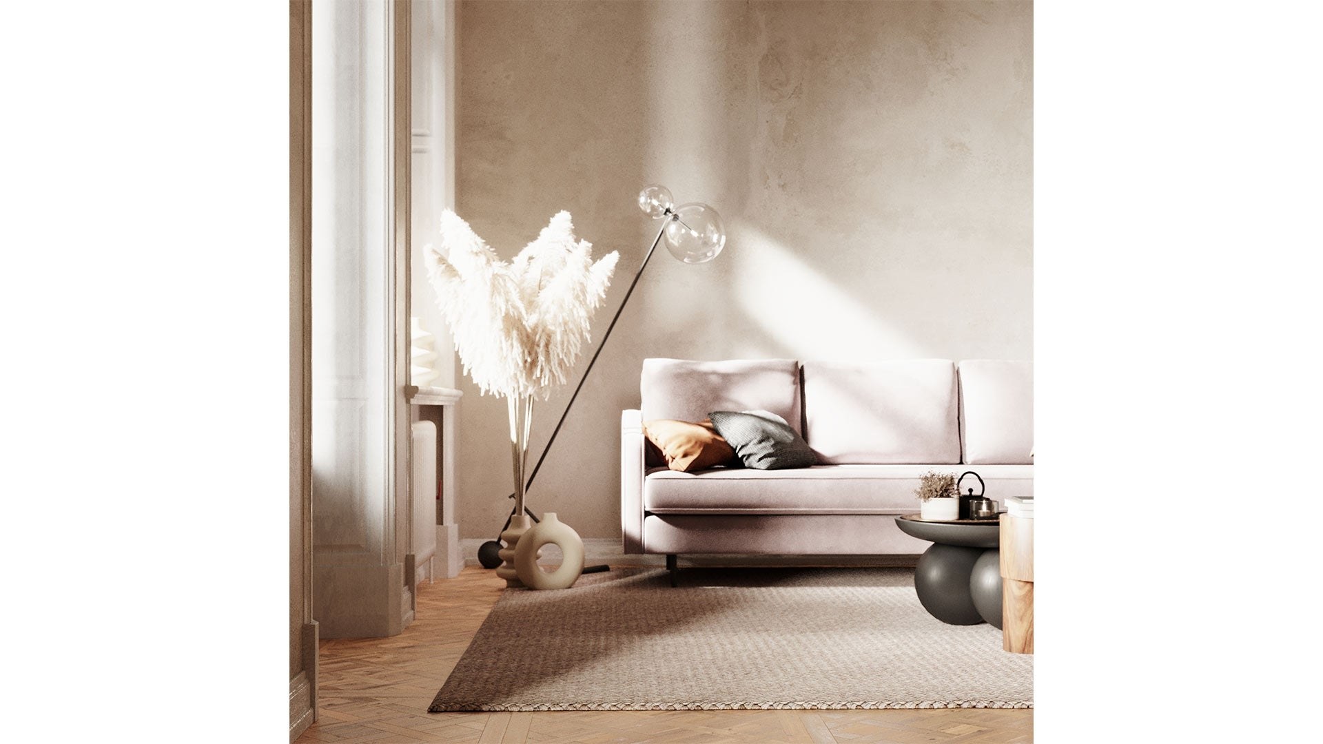 Sofa văng Abbe SF-429 màu hồng nhạt, chụp từ góc thấp, nhìn thấy toàn bộ chiều dài sofa. Sofa được đặt trên thảm dệt màu b…