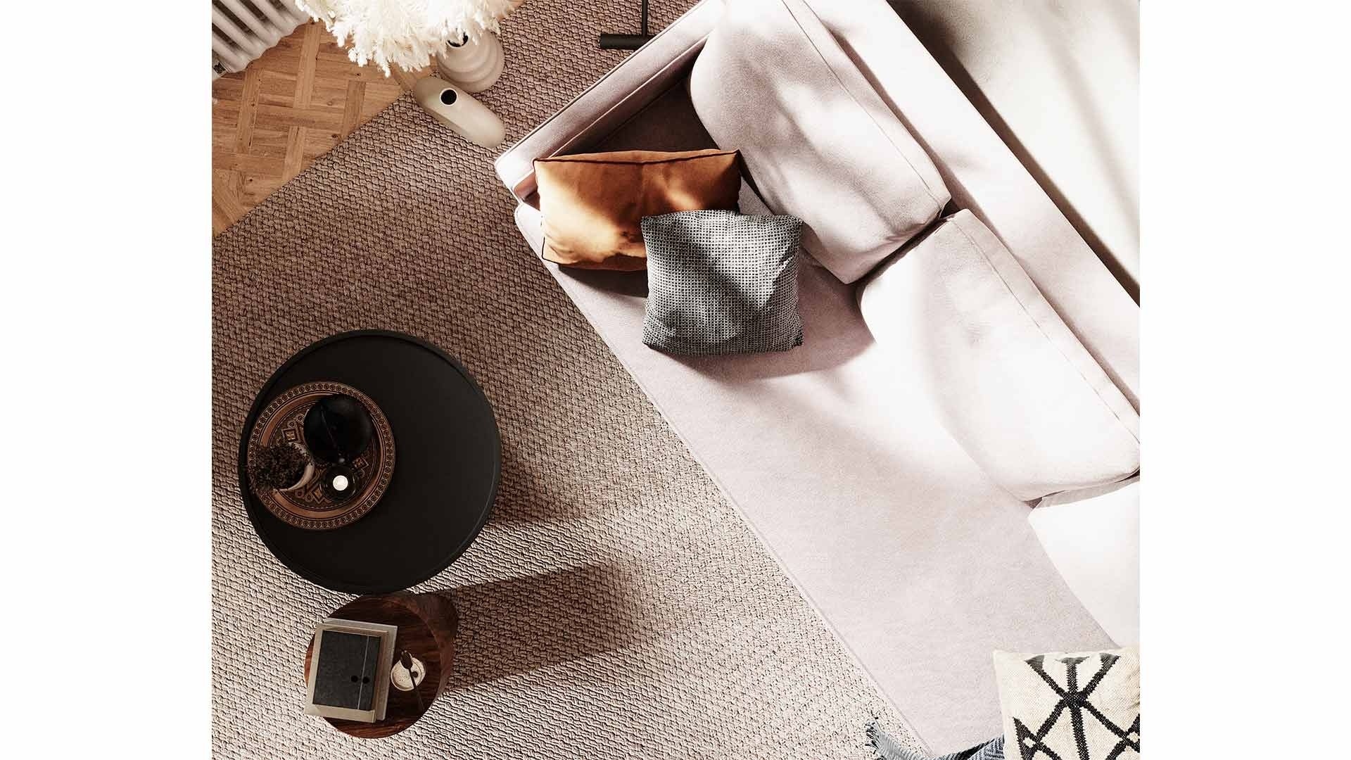 Góc nhìn từ trên cao xuống sofa văng SF-429 màu hồng nhạt, tập trung vào phần đệm ngồi và gối tựa. Bố cục cho thấy sự sắp…