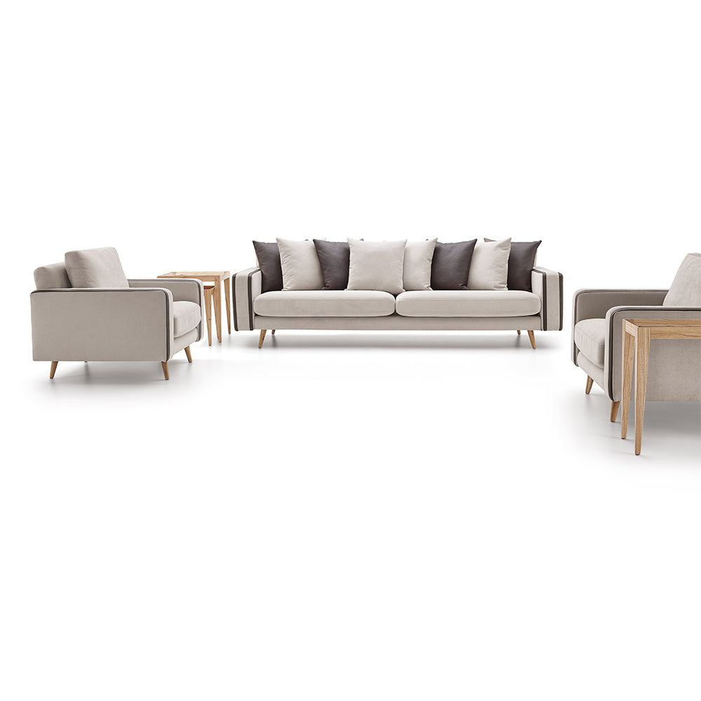 Toàn cảnh bộ sofa phòng khách phong cách hiện đại, bao gồm một sofa băng dài, hai ghế sofa đơn và hai bàn trà nhỏ, tất cả…