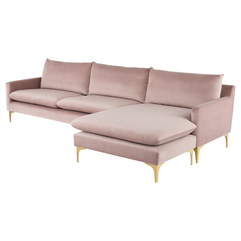 Sofa góc SF-387 màu hồng phấn sang trọng, chụp từ góc cao phía trước bên phải, với các đệm ngồi và tựa lưng căng phồng. Đi…