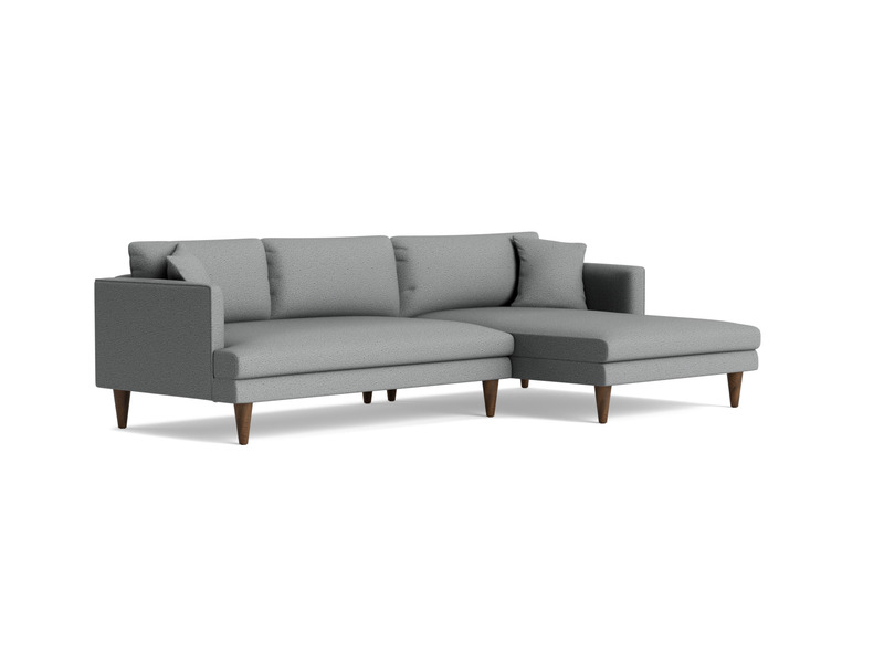 Sofa góc chữ L Lewis SF-489 bọc vải màu xám nhạt, chụp từ góc trước bên phải trên nền trắng. Hình ảnh này tập trung vào ph…