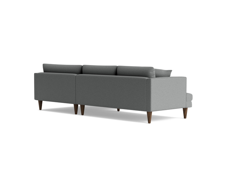 Sofa góc chữ L Lewis SF-489 bọc vải màu xám nhạt, chụp từ góc sau bên phải trên nền trắng. Hình ảnh này làm nổi bật phần g…
