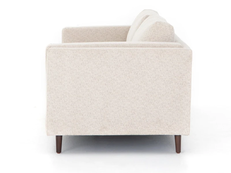 Sofa băng Ezra SF-222 nhìn từ góc ngang bên phải, cho thấy chiều sâu của ghế và thiết kế tay vịn dày dặn. Chất liệu vải bọ…