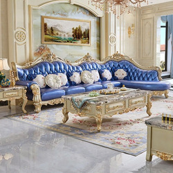 Bộ sofa góc tân cổ điển nhập khẩu SB908-3B màu xanh dương nổi bật trong không gian phòng khách sang trọng. Sofa có lưng tự…