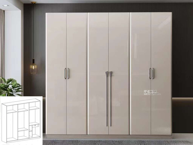 Tủ quần áo 6 cánh hiện đại, màu trắng kem bóng, được chụp chính diện trong một phòng ngủ tối giản. Tủ có thiết kế phẳng, t…