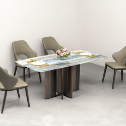 Bộ bàn ăn 4 ghế BA934 được chụp từ góc rộng, đặt trong không gian phòng ăn tối giản với tường trắng và sàn xám. Mặt bàn đá…