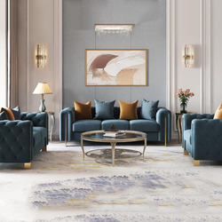 Bộ sofa phong cách Mỹ gồm một băng ba và hai ghế đơn, bọc vải nhung màu xanh ngọc bích sang trọng, chân và viền kim loại m…