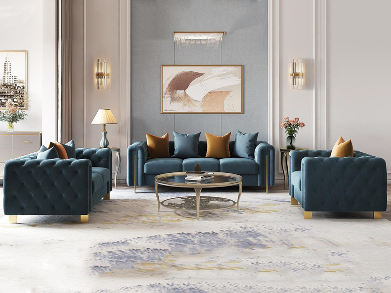 Bộ sofa phong cách Mỹ gồm một băng ba và hai ghế đơn, bọc vải nhung màu xanh ngọc bích sang trọng, chân và viền kim loại m…