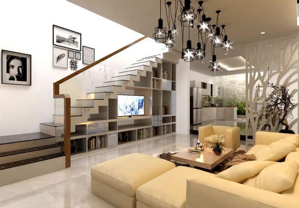 Bố trí sofa, bàn trà và kệ tivi cân đối trong phòng khách nhà ống