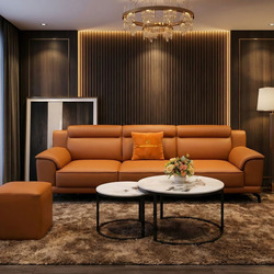 Toàn cảnh phòng khách luxury với bộ sofa băng SB01-Lex16 màu nâu da bò, đôn và bàn trà đôi. Không gian được trang trí tinh…