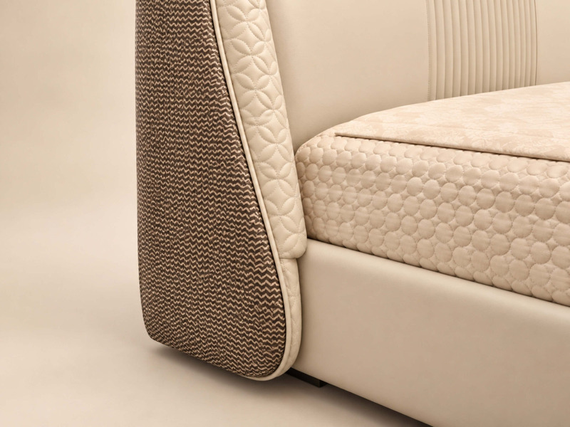 Cận cảnh phần chân giường và cạnh giường của Giường Ngủ Pegasus Luxe GIQF811-18. Thân giường bọc da màu kem, kết hợp với c…