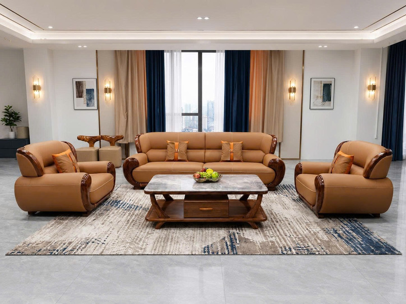 Bộ sofa ARCO SBF311-114 gồm một băng dài và hai ghế đơn, bọc da màu nâu vàng, với khung gỗ Mun tự nhiên uốn lượn ở tay vịn…