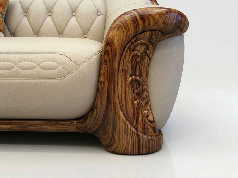 Cận cảnh chi tiết tay vịn của ghế sofa băng trong bộ SB8103-124. Tay vịn được làm từ gỗ mun tự nhiên với các đường vân gỗ…