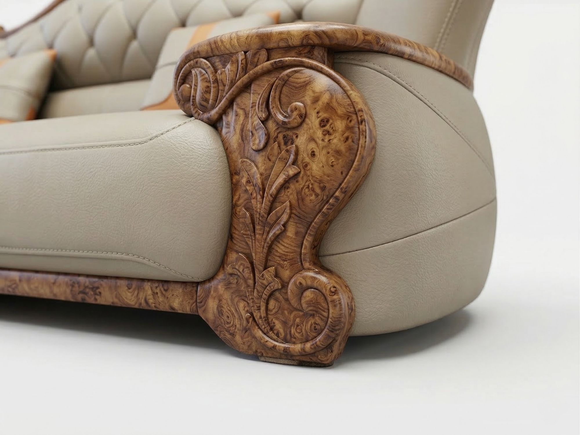 Cận cảnh tay vịn của ghế sofa, nổi bật với phần khung gỗ mun tự nhiên được chạm khắc hoa văn cầu kỳ, mang đậm phong cách t…
