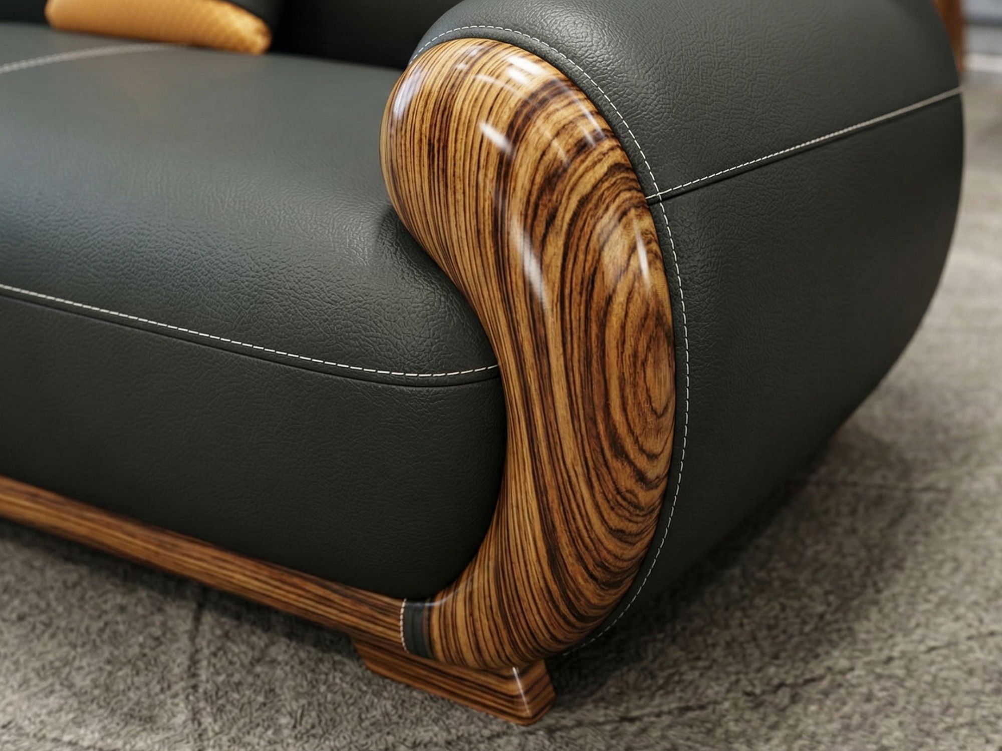Chi tiết đường may và chất liệu da bò tự nhiên trên tay vịn sofa, kết hợp với phần gỗ Mun uốn cong mềm mại. Đường chỉ may…