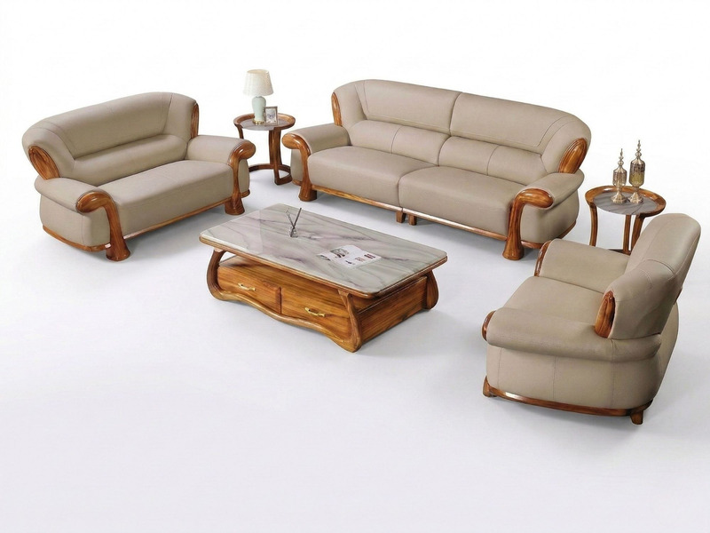 Toàn cảnh bộ sofa gỗ Mun nhập khẩu màu be, gồm 1 ghế đơn, 1 ghế đôi, 1 ghế băng dài, cùng bàn trà mặt đá và bàn phụ, được…